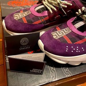 Versace chain reaction sneakers.